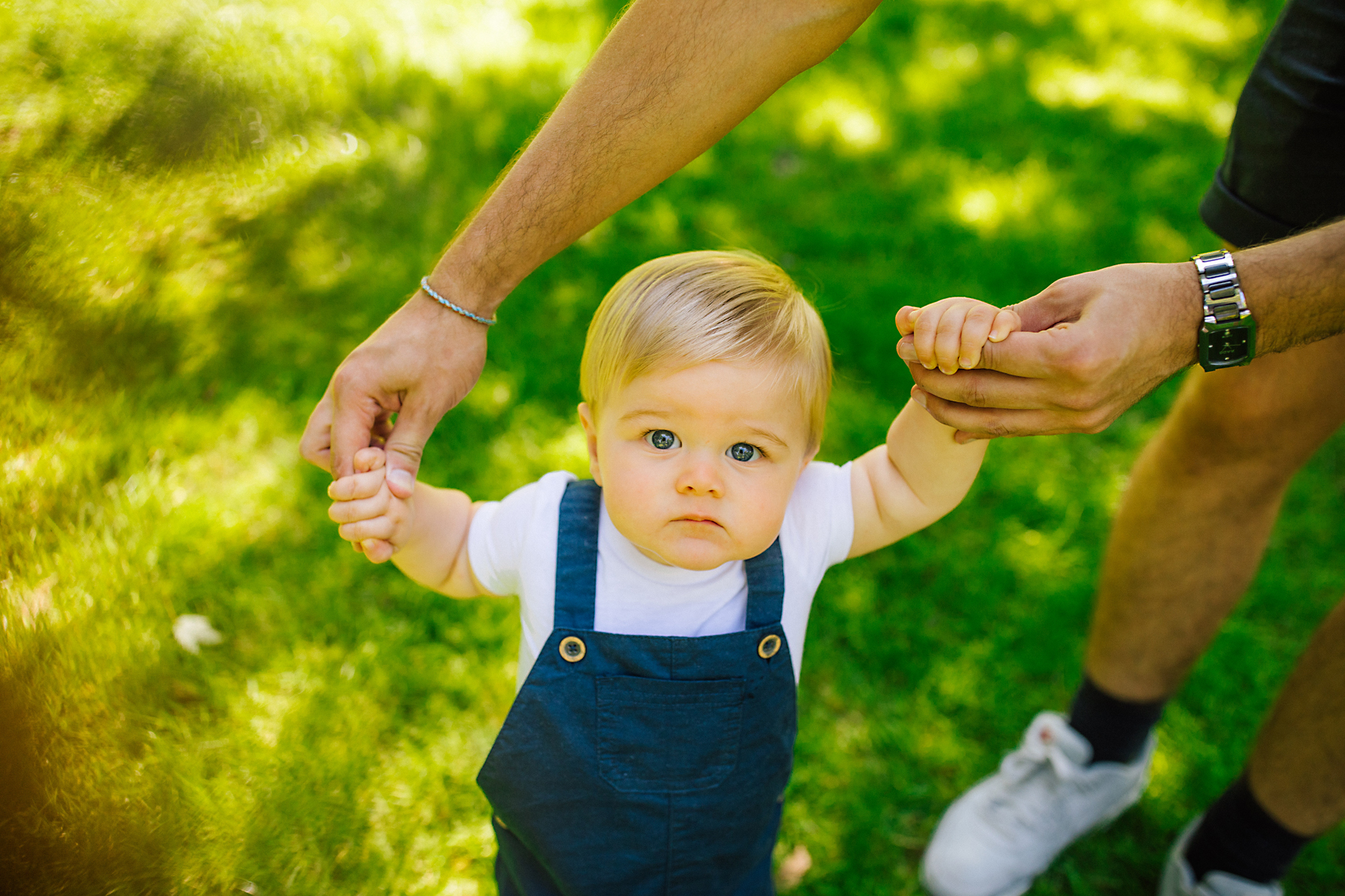 holding mummy and daddys hands