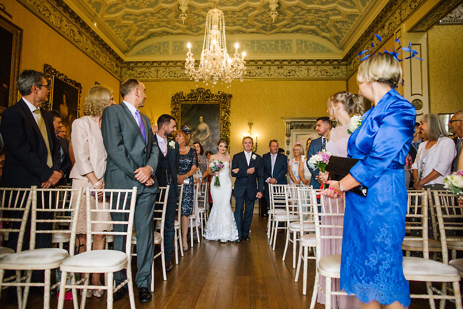 bride and dad walking down aisle at arley hall