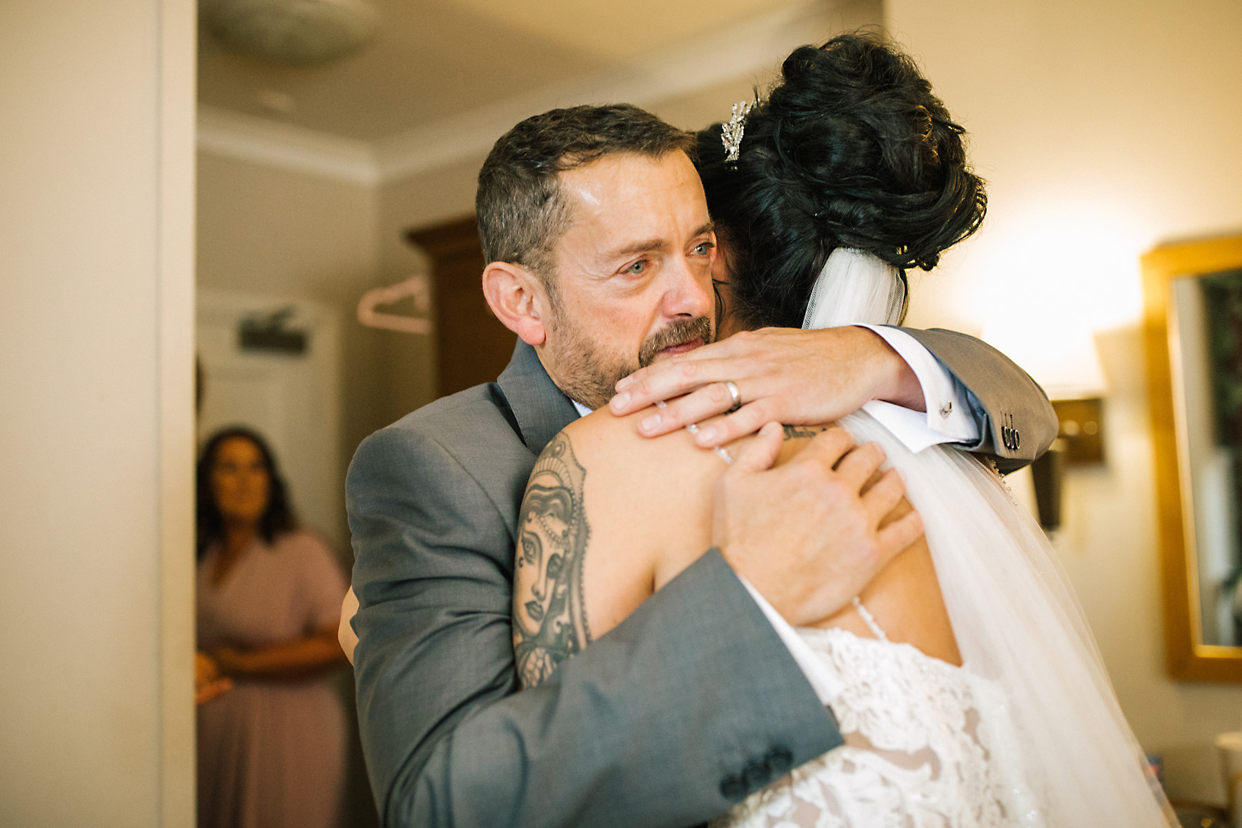 bride hugging dad