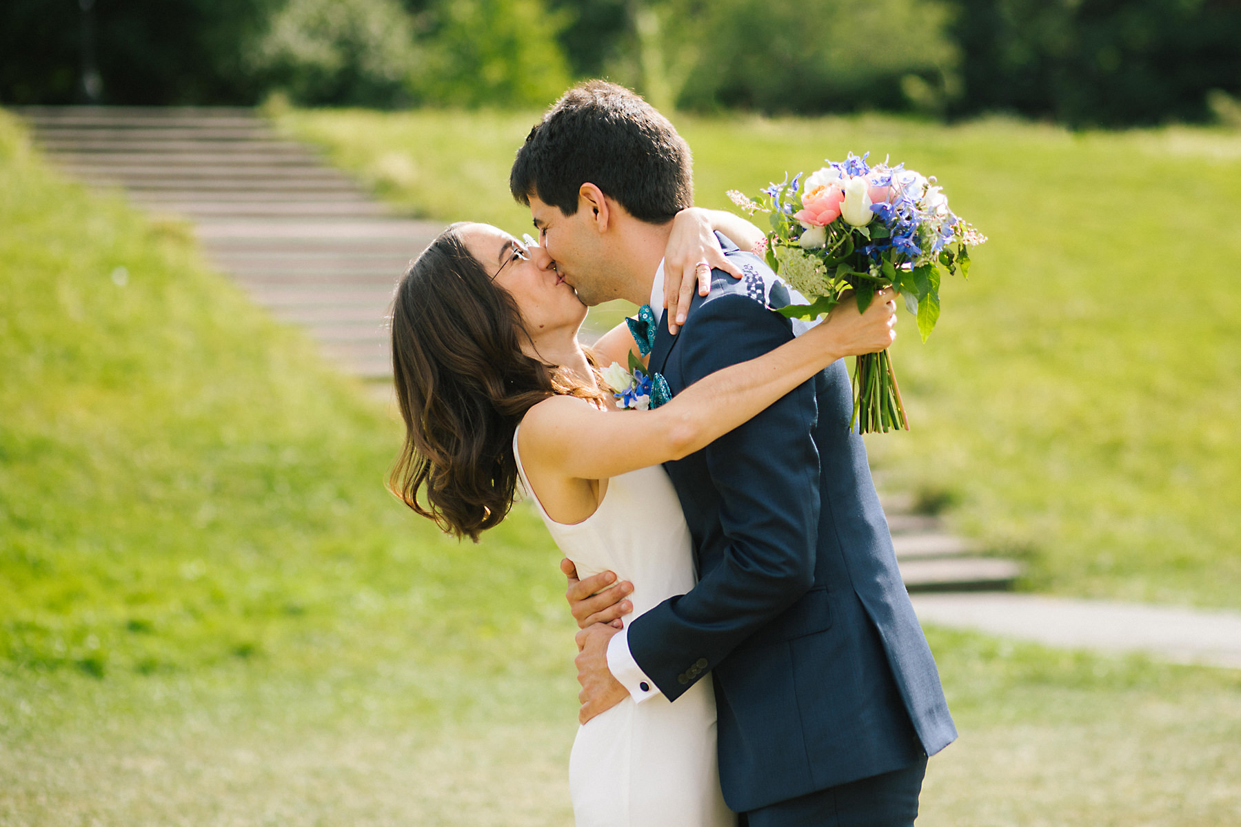 bride and groom kiss