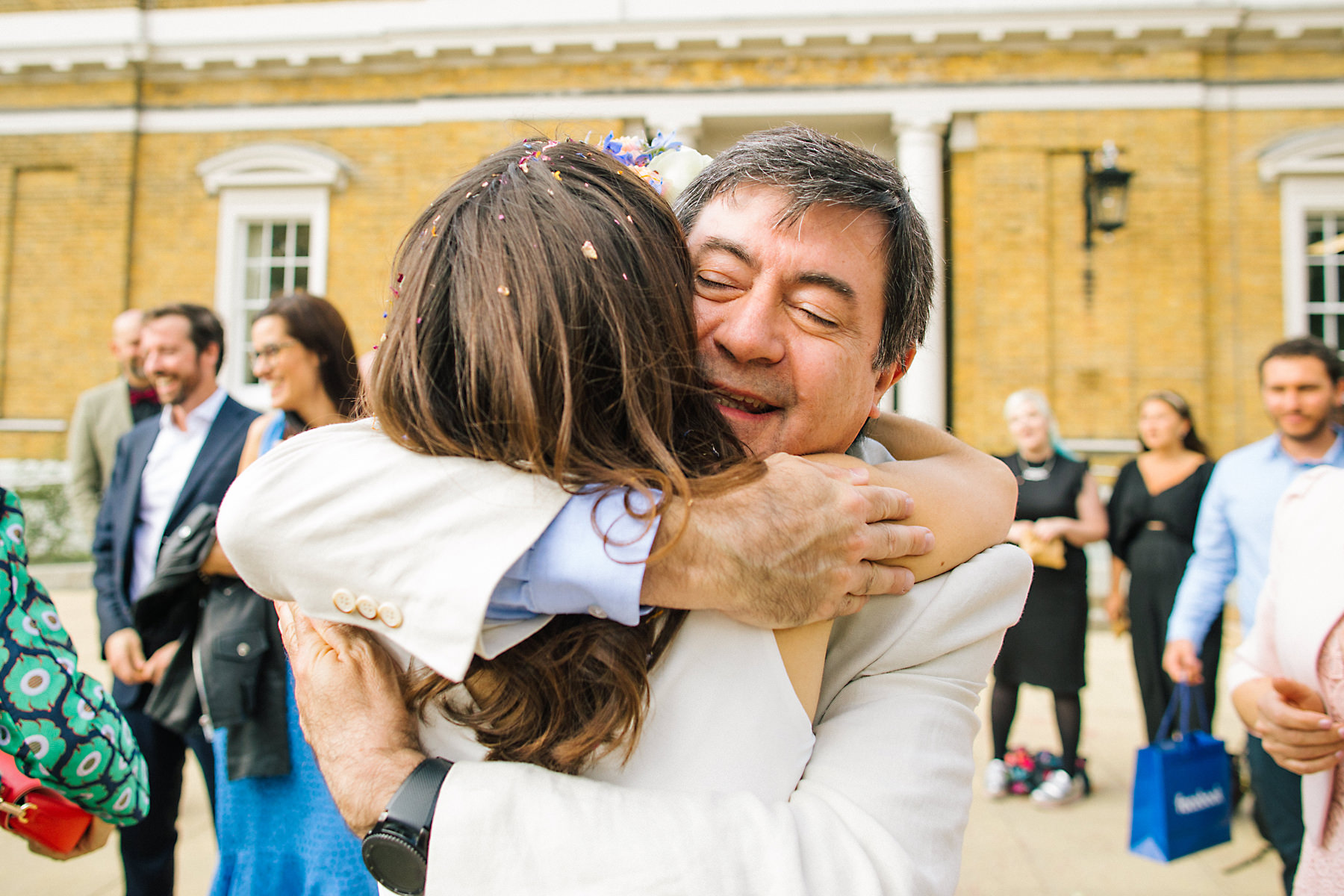 bride hugging guests