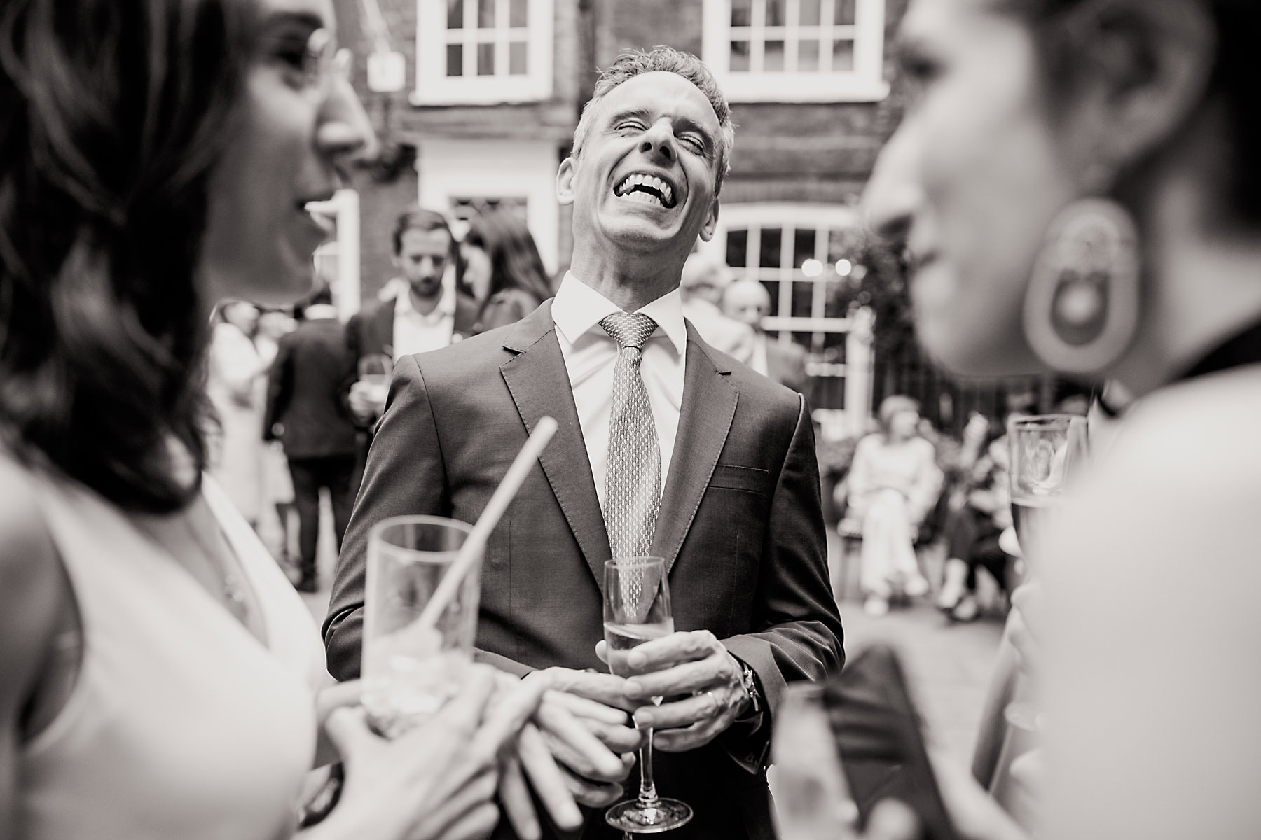 wedding guests laughing