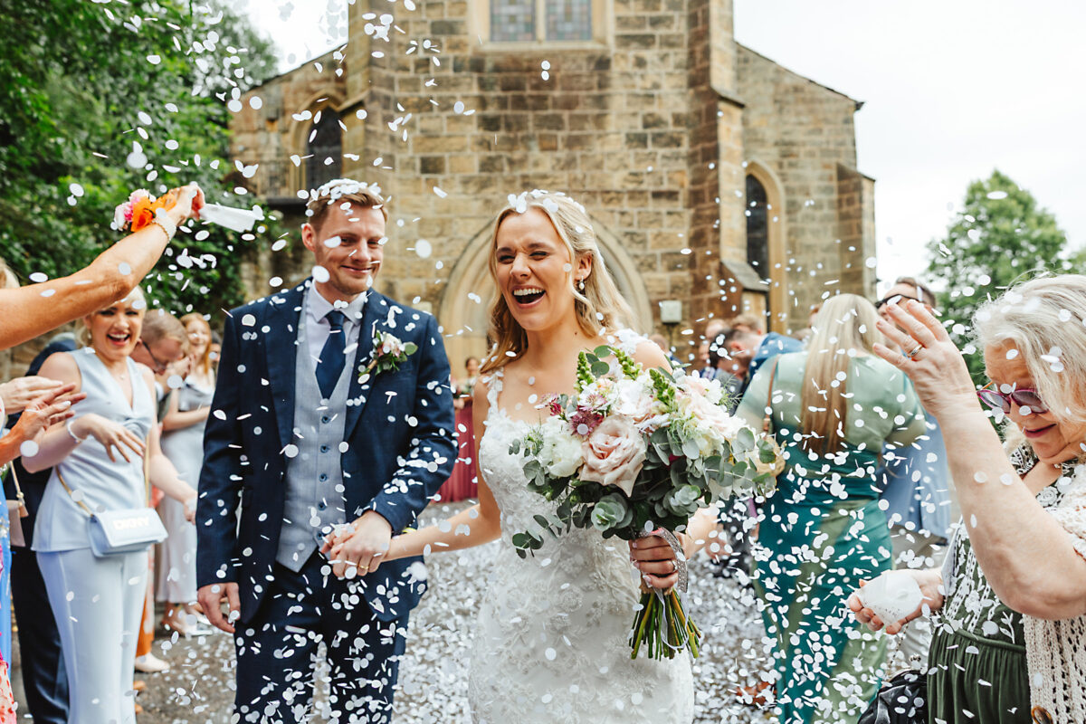 bride and groom outside cheshire church